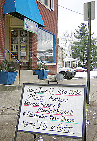 sign outside the Blue Marble