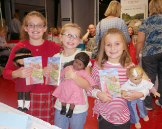 3 girls with dolls